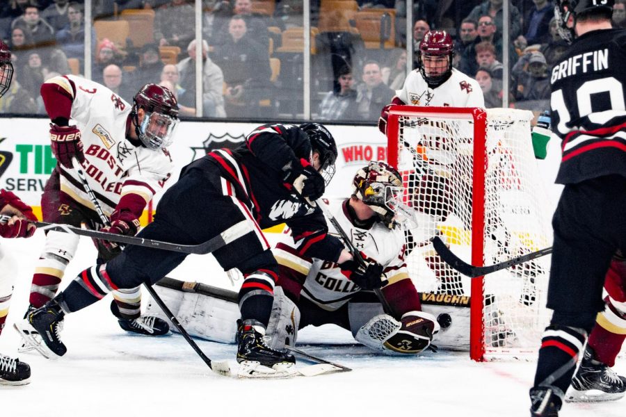 Senior forward Austin Levy scores the first goal in the Beanpot final against Boston College. Plevy is in his first season at NU after transferring from UMass.