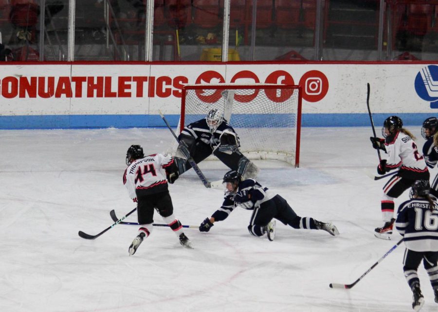Sophomore forward Taze Thompson skates toward the net. Thompson scored her fouth goal of the season in the recent game against UNH.