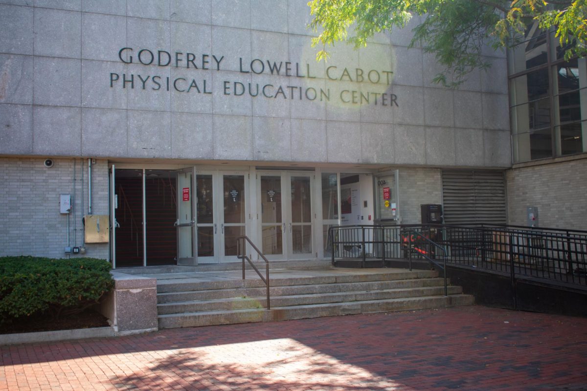 The Cabot Center, where the Northeastern track and field team trains, stands on Huntington Avenue. A former Northeastern track and field coach was charged Tuesday on accusations related to a nude photo scheme.