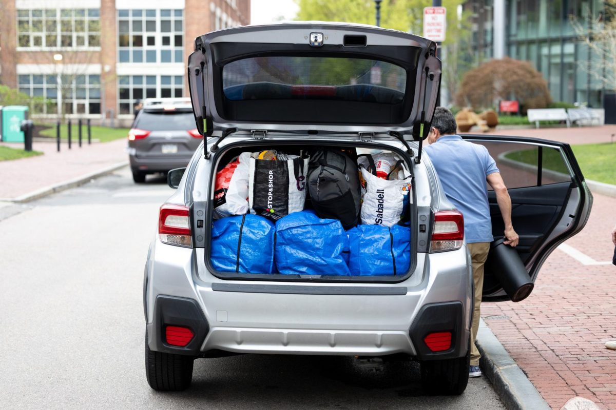 A parent enters a car with a fully packed trunk. Students decorated their residence halls with knick-knacks, but often found that many items went unused throughout the year.